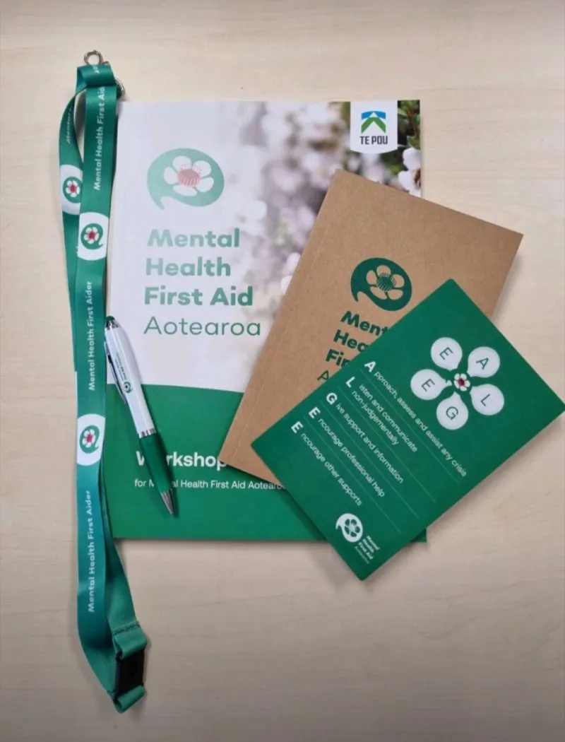Mental Health First Aid Aotearoa workbook, lanyard, and ALGEE action cards